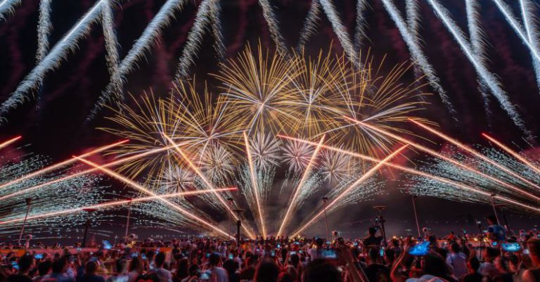 Avoiding Crowds - Fireworks over Crowd at Night