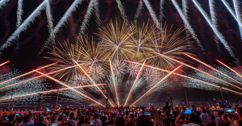 Avoiding Crowds - Fireworks over Crowd at Night