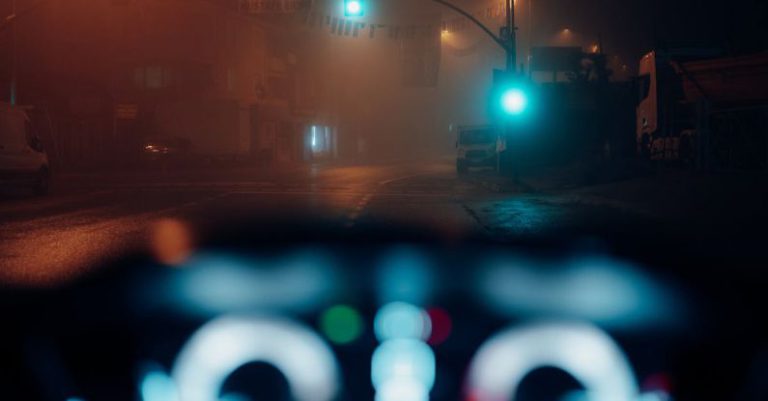 Drive Itinerary - A dashboard with a view of the road at night