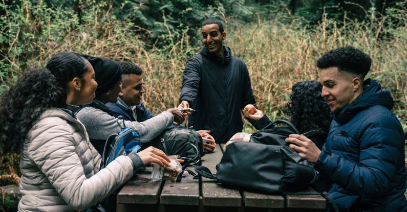 Hiking Snacks - Friends Sharing Snacks to Each Other