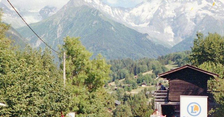 Crowded Trails - A Crowded Street with Mountains in the Background