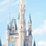 Day Trip Itinerary - White fairy tale castle with blue roofs in amusement park in Orlando against bright sky on sunny day